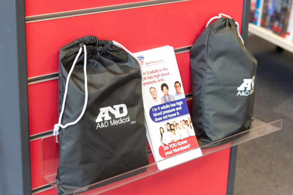 Blood pressure monitor loan kits available through Wiveliscombe Library, with carry cases and information about checking blood pressure as part of the library's health and wellbeing services.