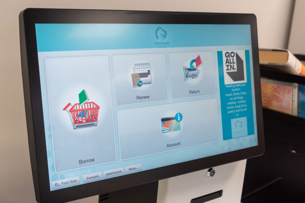 Self-service borrowing kiosk at Wellington Library with touchscreen options for borrowing, renewing and returning library items, and managing customer accounts.