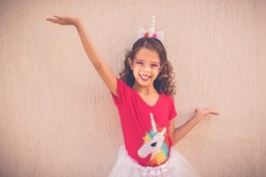 Girl dressed as unicorn ballerina photograph