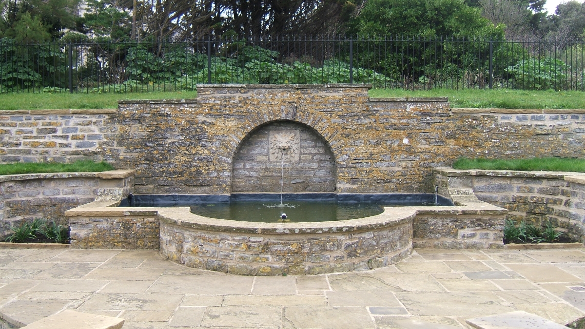 Photo of the restored lion’s head fountain and splash pool