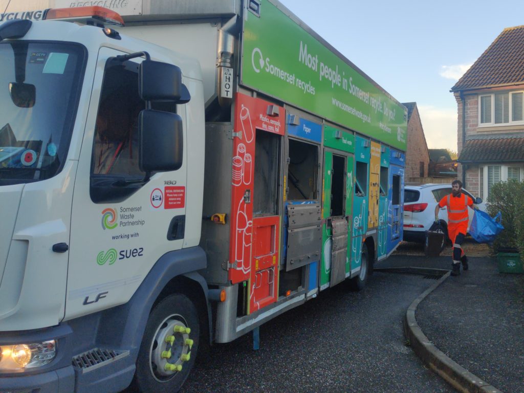 An images of a recycling lorry and a person collecting waste