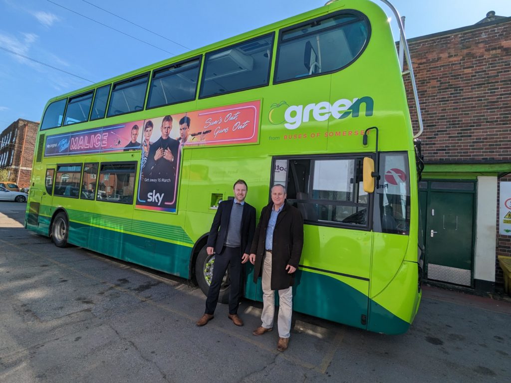 Image of a green double decker bus
