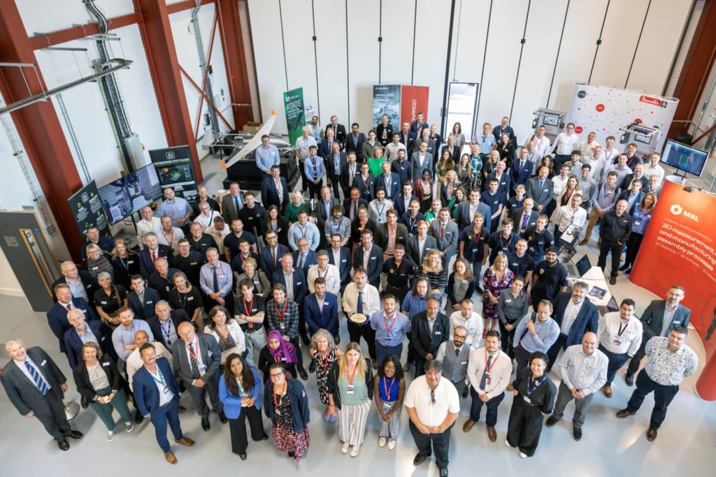 Large group of attendees at iAero One Year On event