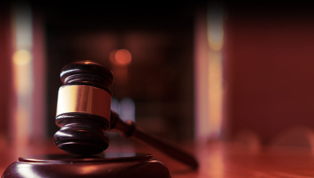 Legal law concept image gavel on desk in office