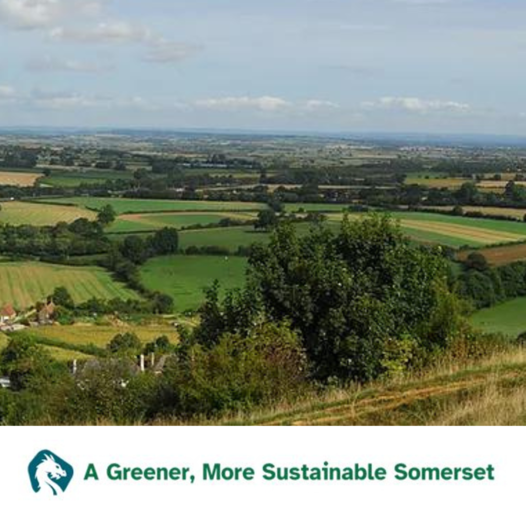 A somerset landscape with wording beneath saying a greener more sustainable somerset