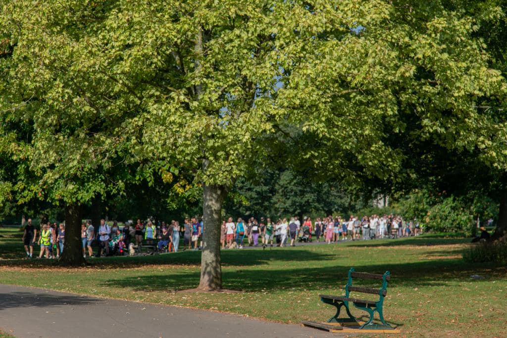Photo shows some of the people talking part in the walk in Vivary Park