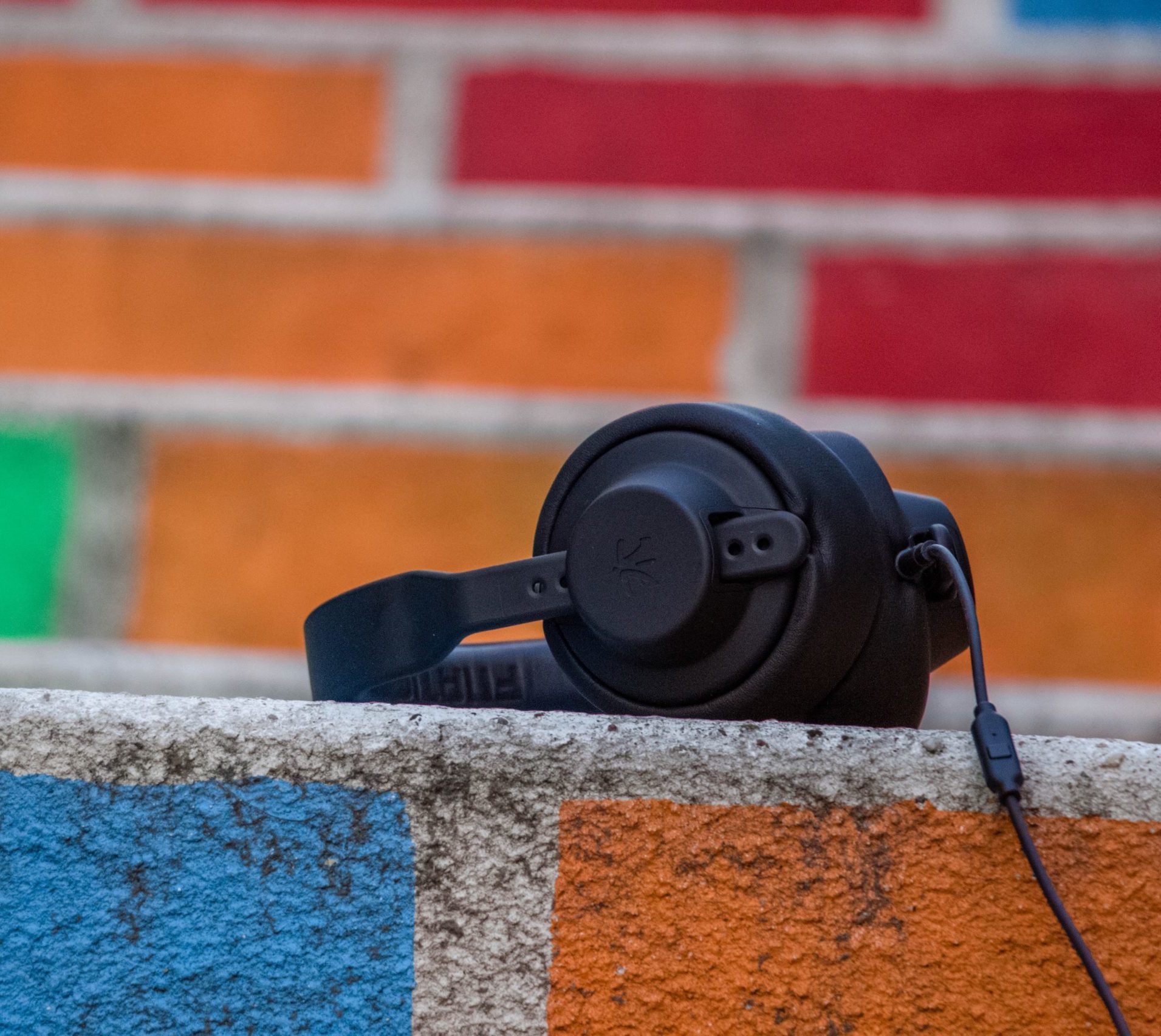 Headphones on a brick wall