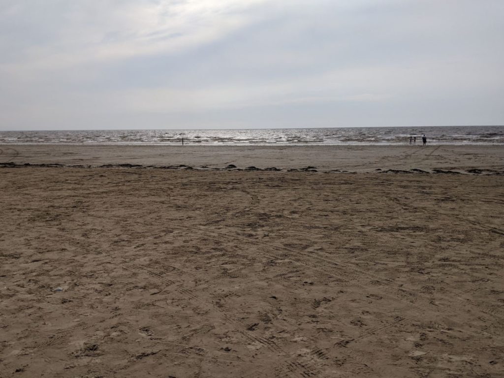 Berrow beach with the sea in the distance