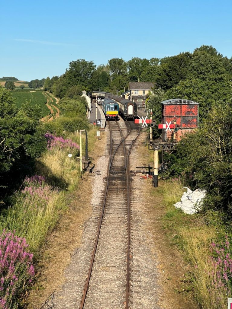 East Somerset Railway, steam train travelling down the track