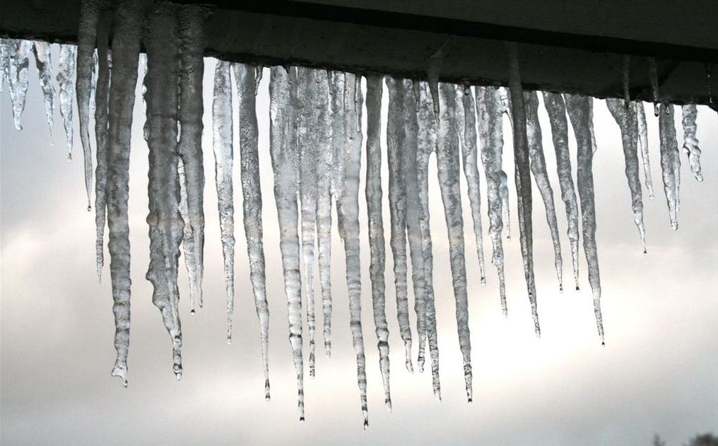 Icicles hanging off a roof