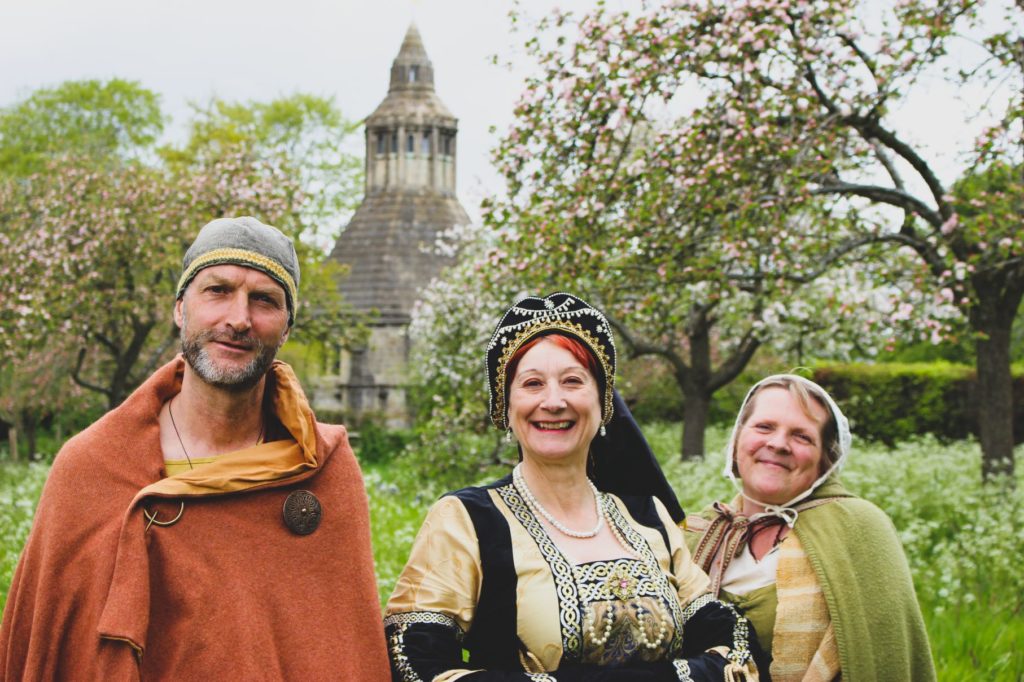 Glastonbury Abbey, tour guides smiling for photo