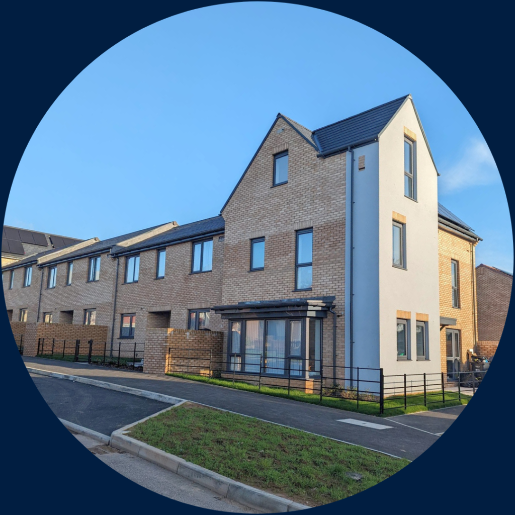 Photo of newly built homes on a sunny day.