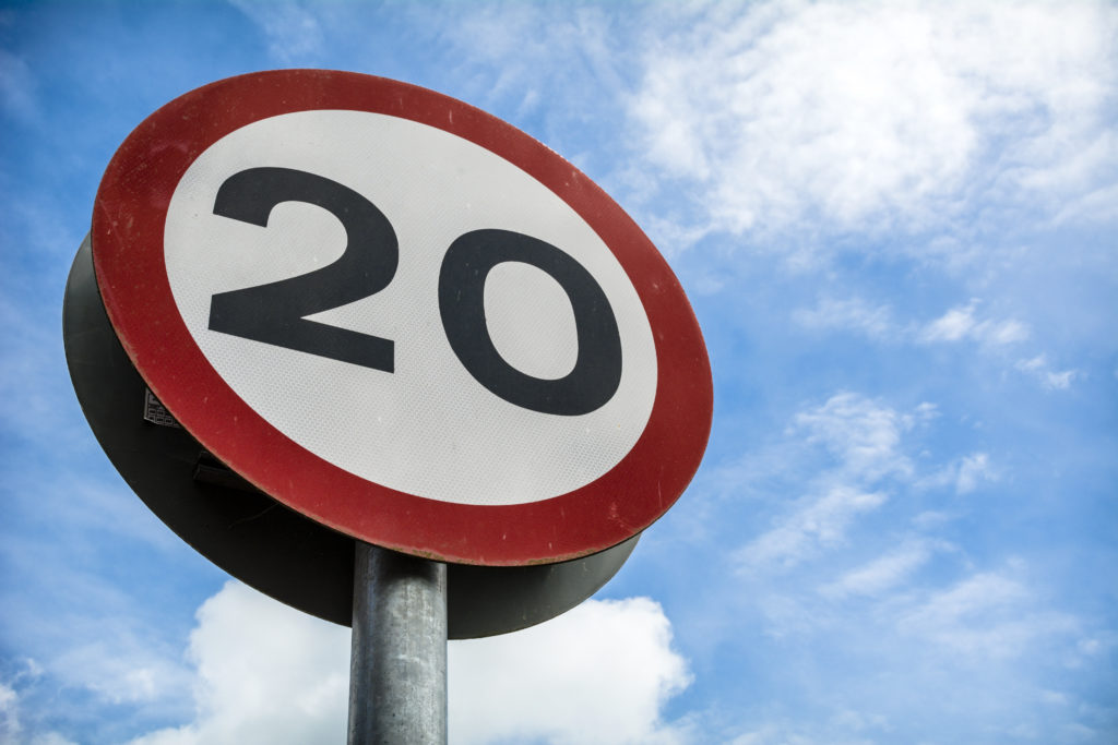20 speed limit road sign