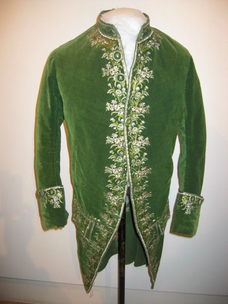 Green coat on a mannequin