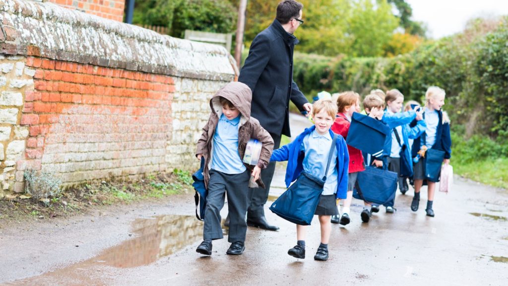 Photograph of school children walking in a line