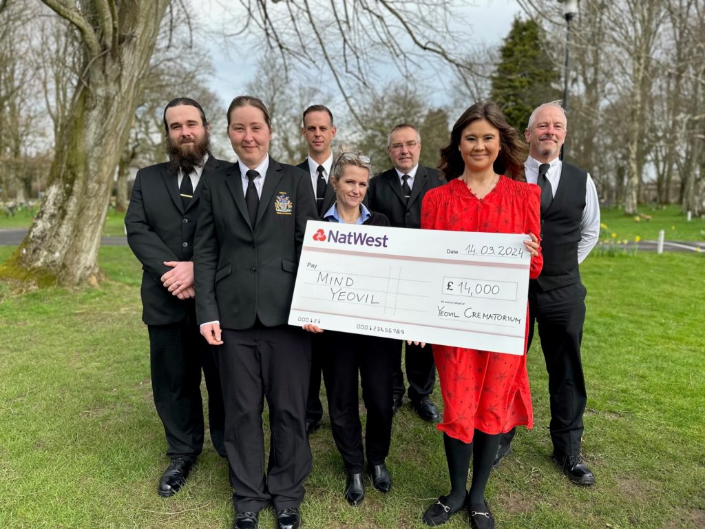 Yeovil Crematorium team presents cheque to Mind in Somerset.
