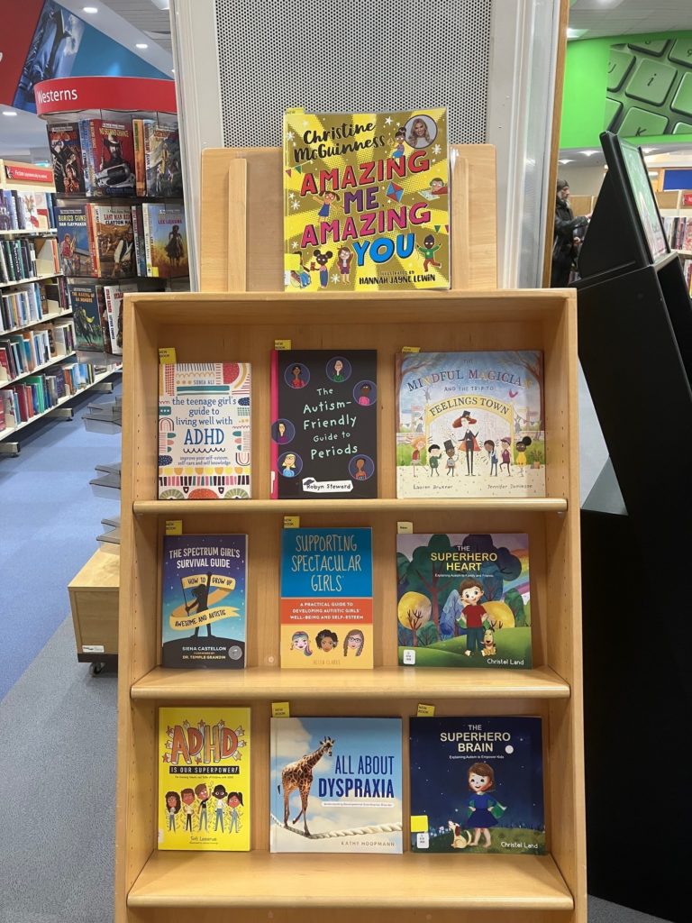Library bookshelf display of children's neurodiversity books