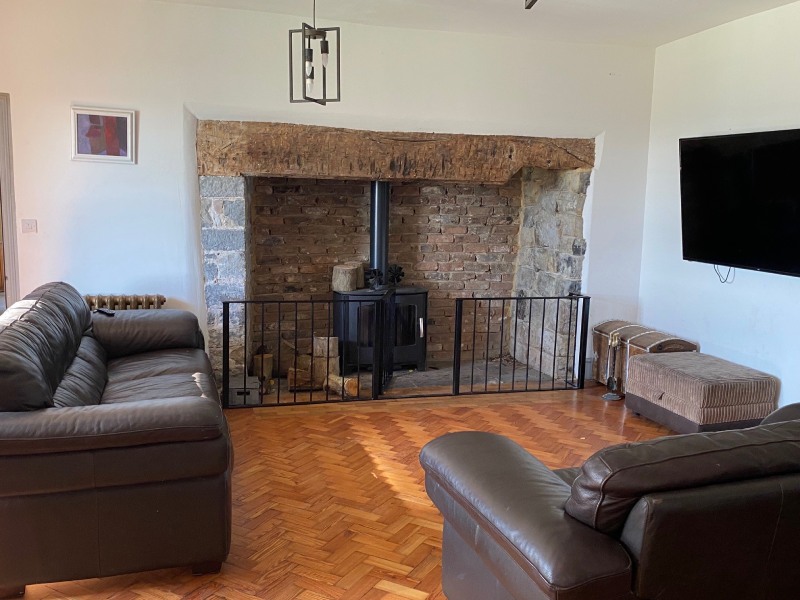 Brean Down Farm fireplace in living room