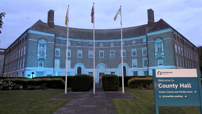 County Hall lit up in blue lighting for Carers Week.