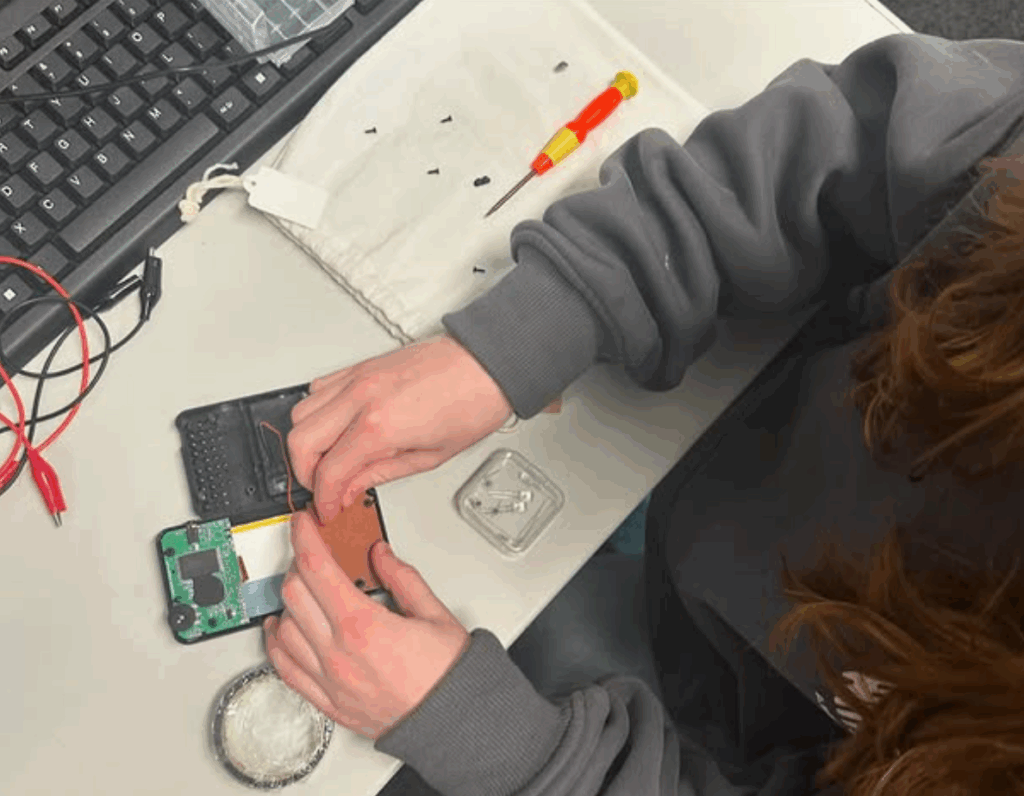 Team Repair at Sexey's School, Bruton, fixing a gadget.