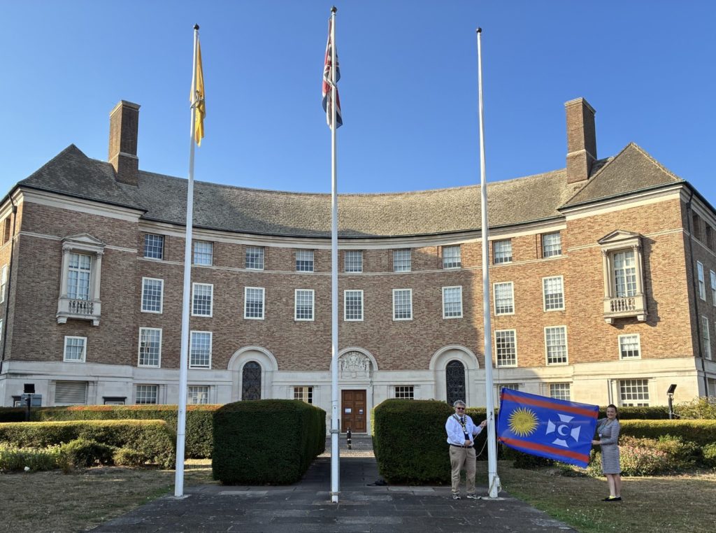 The flag of Vinnytsia in Ukraine being raised outside County Hall in Taunton
