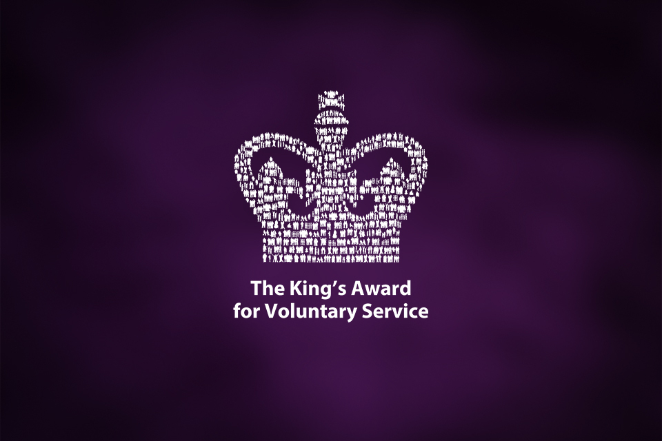 The King's Award for Voluntary Service logo with a crown of human figures on a purple background.