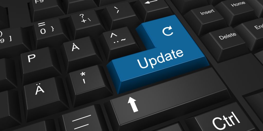 Stock image close-up of a keyboard with a large blue “Update” key replacing the Enter key by Tumisu from Pixabay.