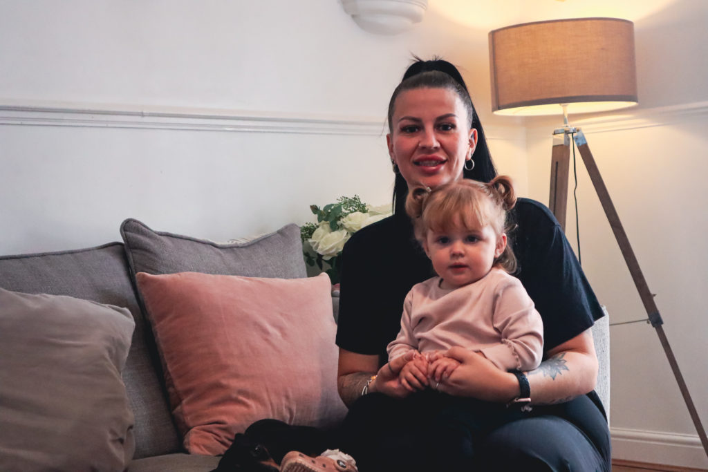 Leanne sitting down with baby daughter Bonnie on her lap