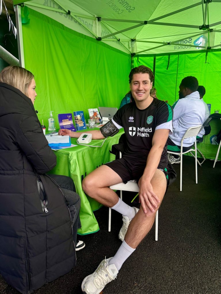 Football player has his blood pressure tested