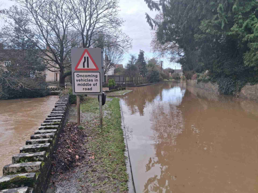 Brown water on flooded road