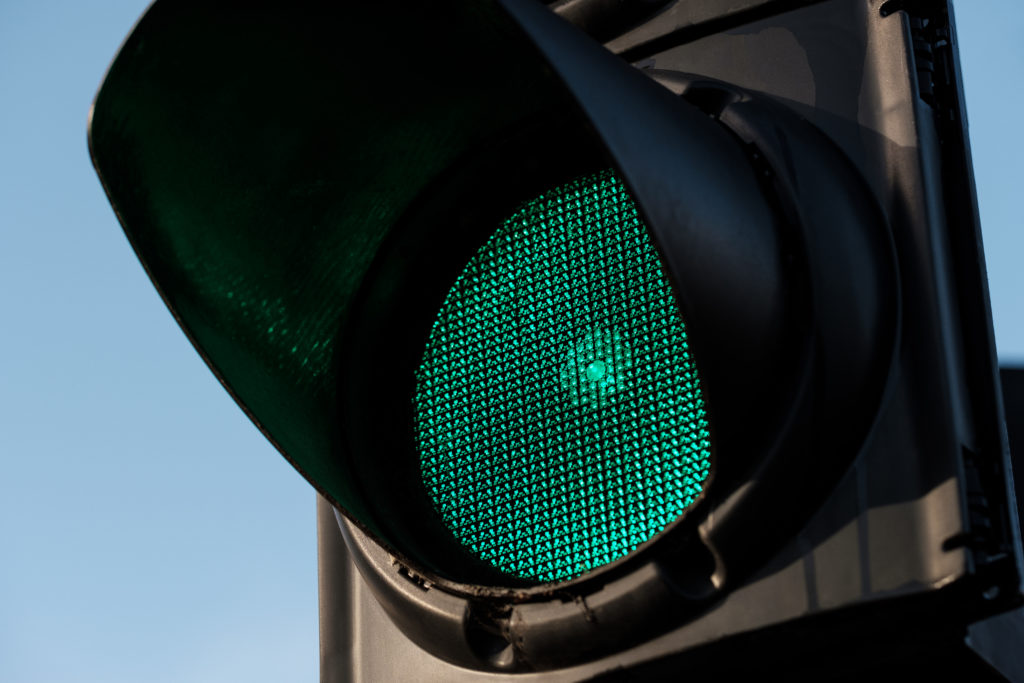 Close-up of green traffic light.