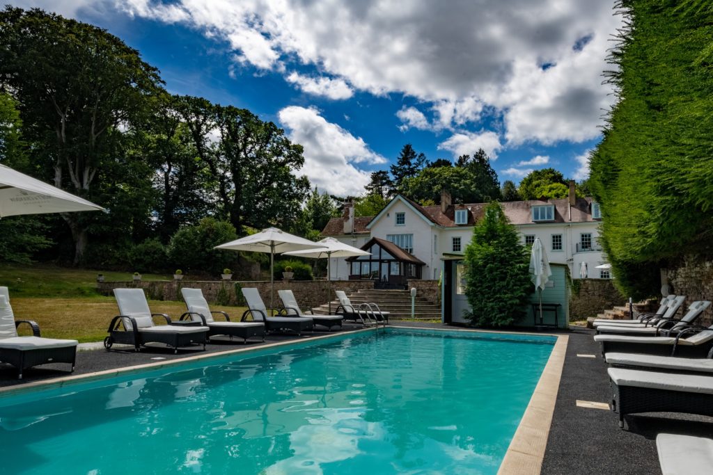 a swimming pool at Croydon Hall an 8-acre exclusive-use country house estate in Somerset